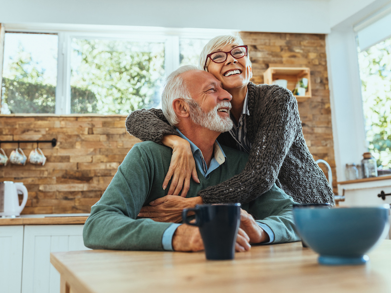 Shot of a mature woman hugging her husband