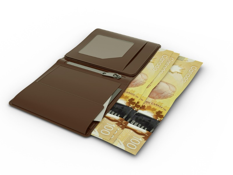 3D rendering of Canadian dollar notes in wallet stock photo