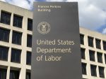 Washington DC USA , Sep 03 2019 : Labor sign and building.