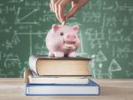 Piggy bank on books