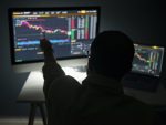 Trader at computer screen