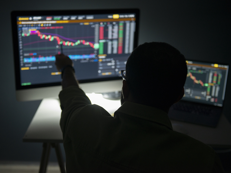 Trader at computer screen