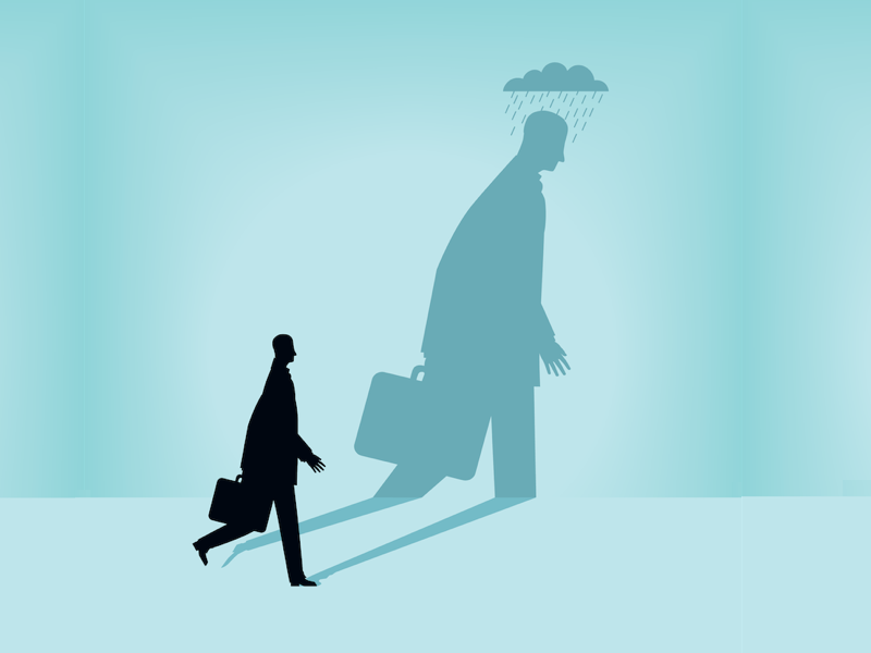 Businessman under cloud